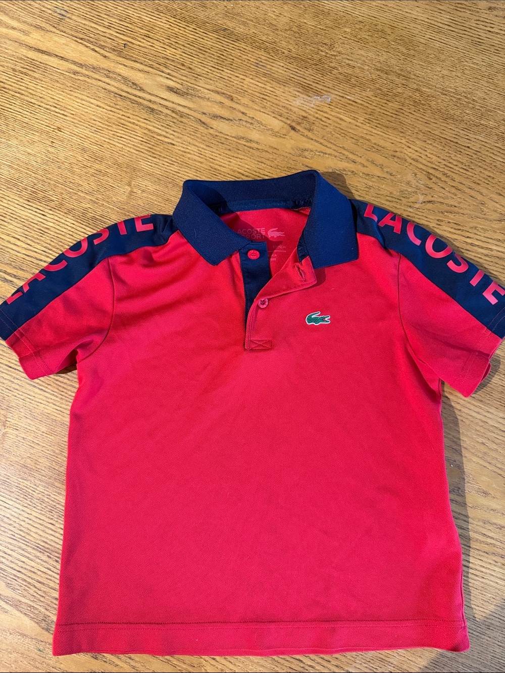 Lacoste Kids size 8, as new, Red Polo with Navy Collar and Shoulder Panels